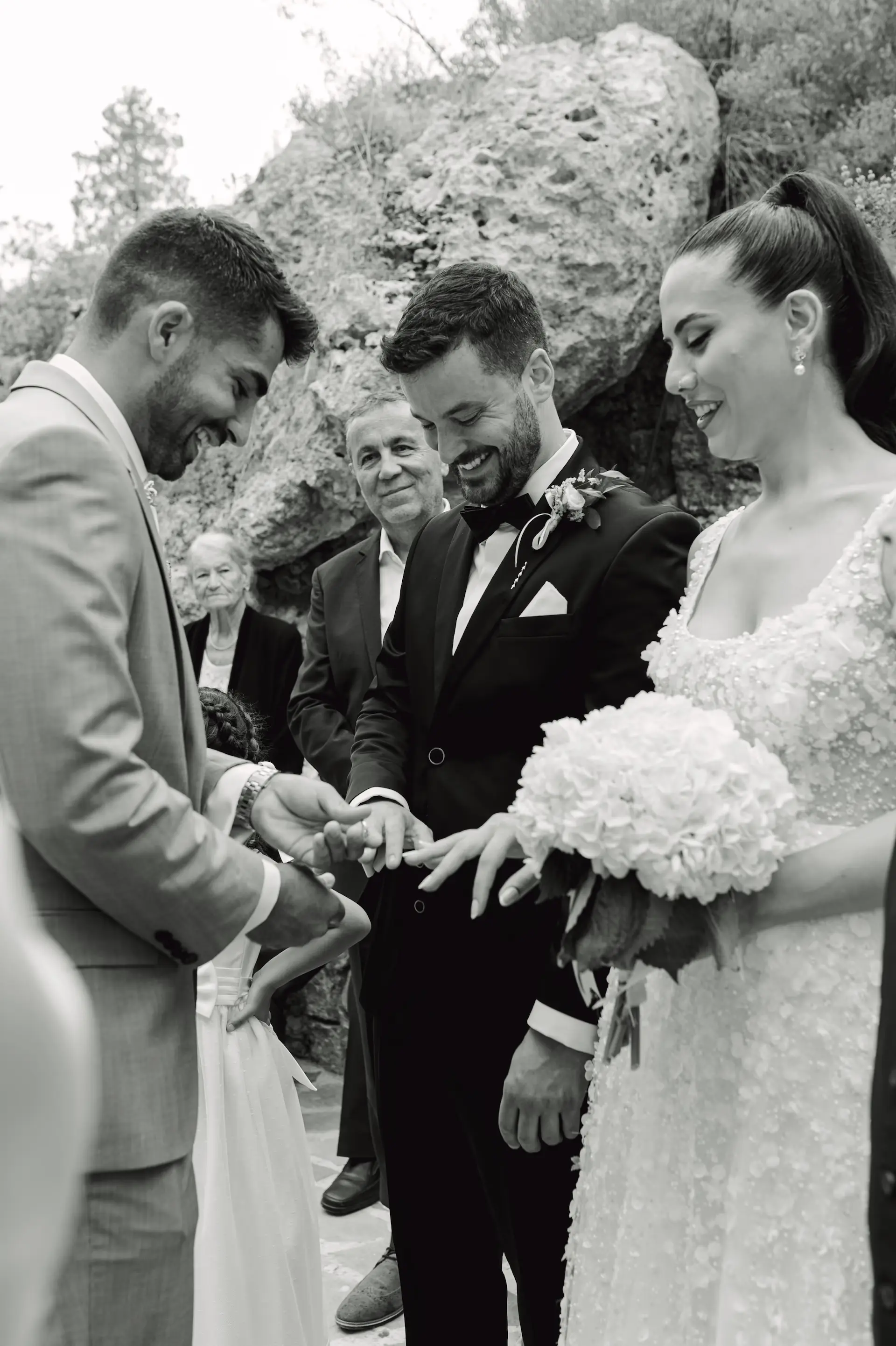 best man changing the wedding rings during ceremony