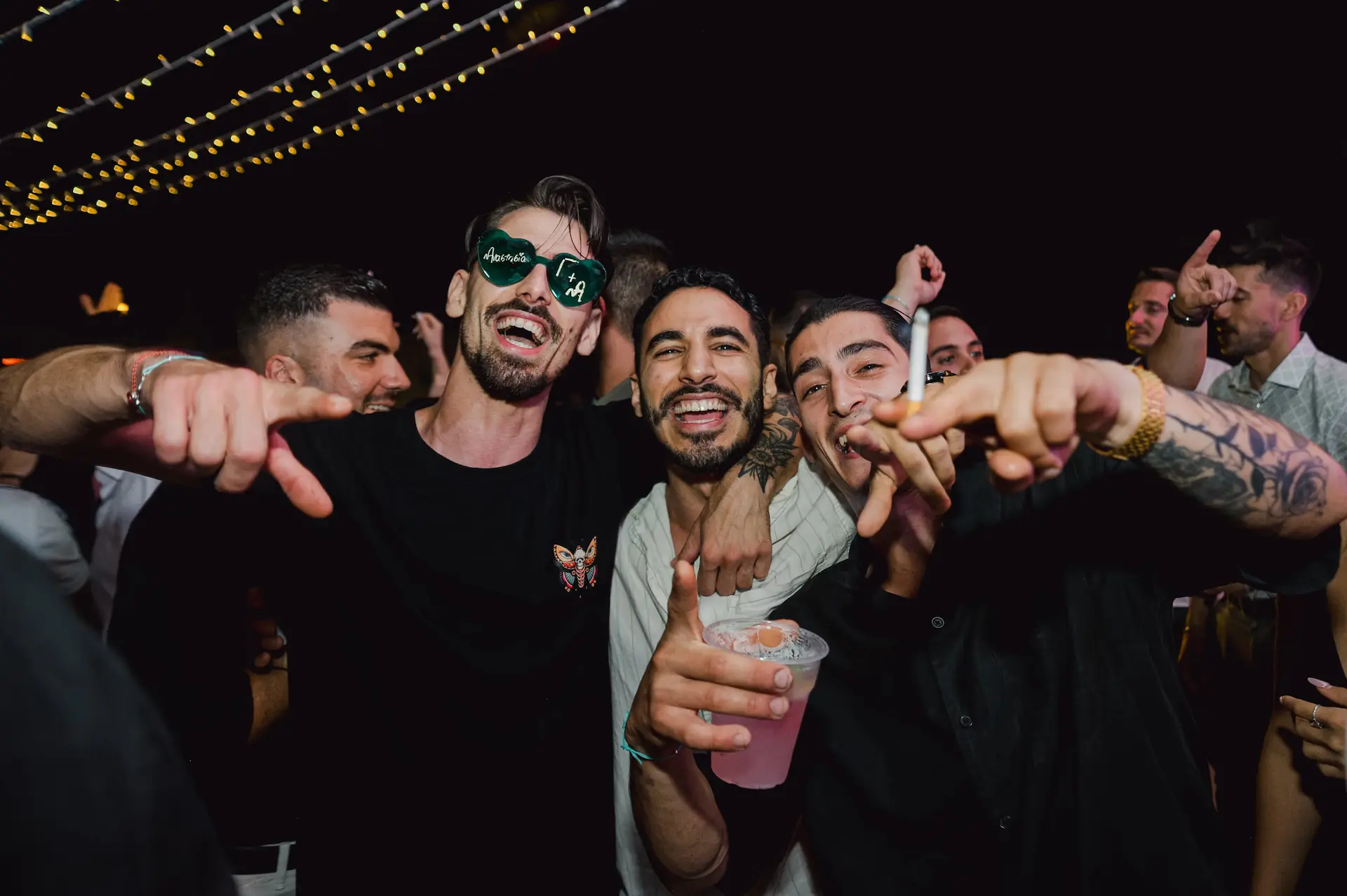 a group of men posing for a picture