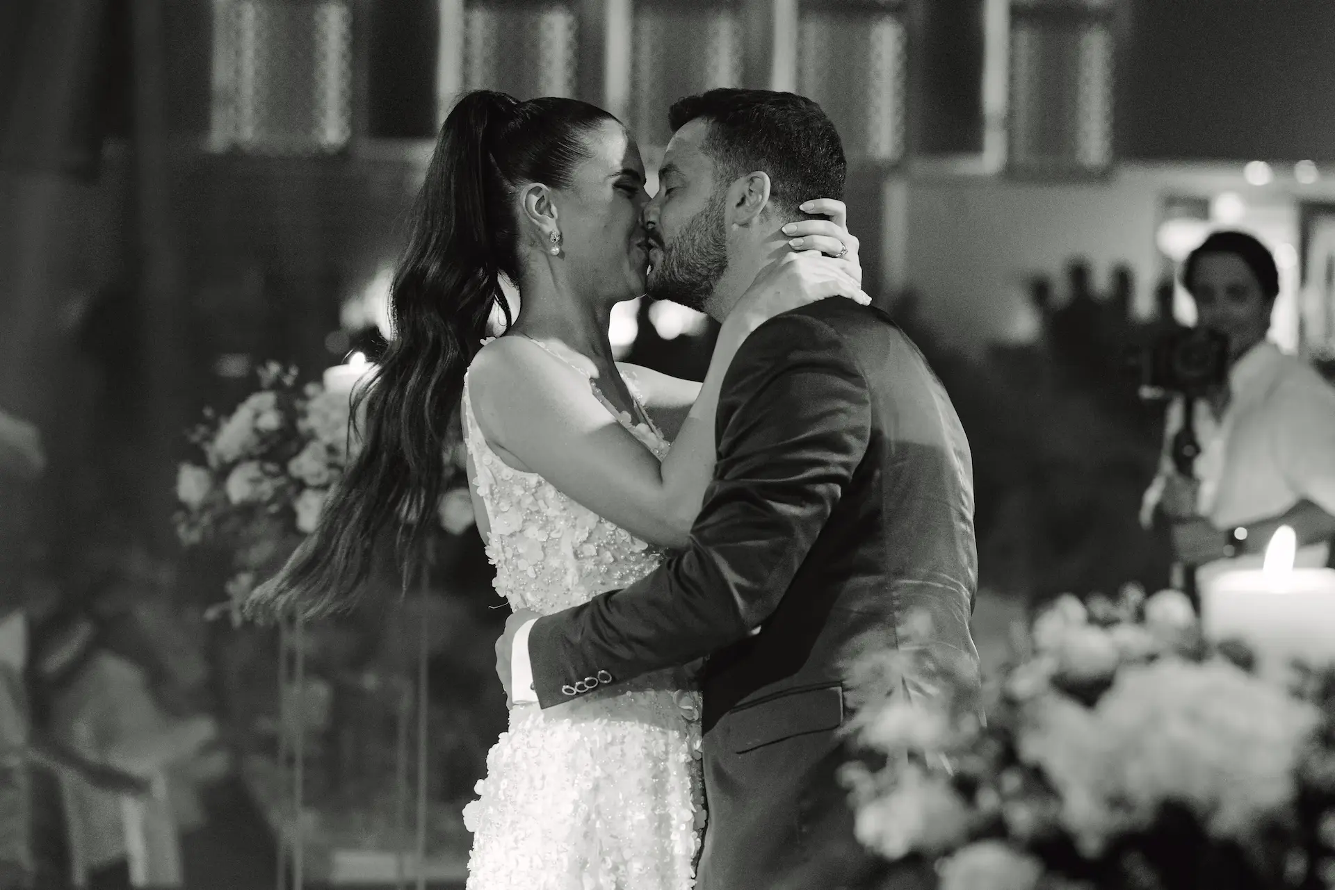groom and bride kissing during their first dance