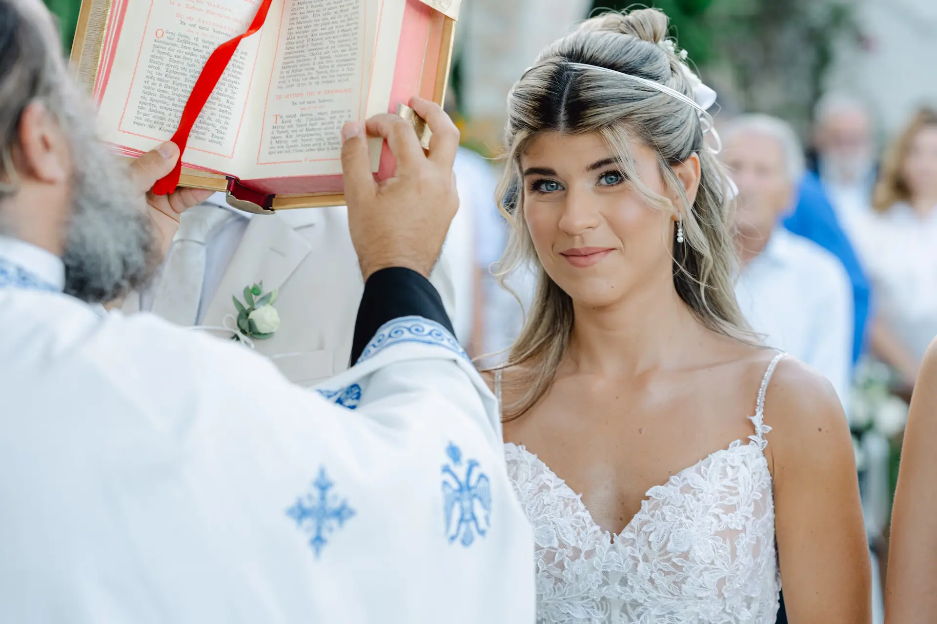 Candid bridal portrait capturing a heartfelt moment of reflection during the service