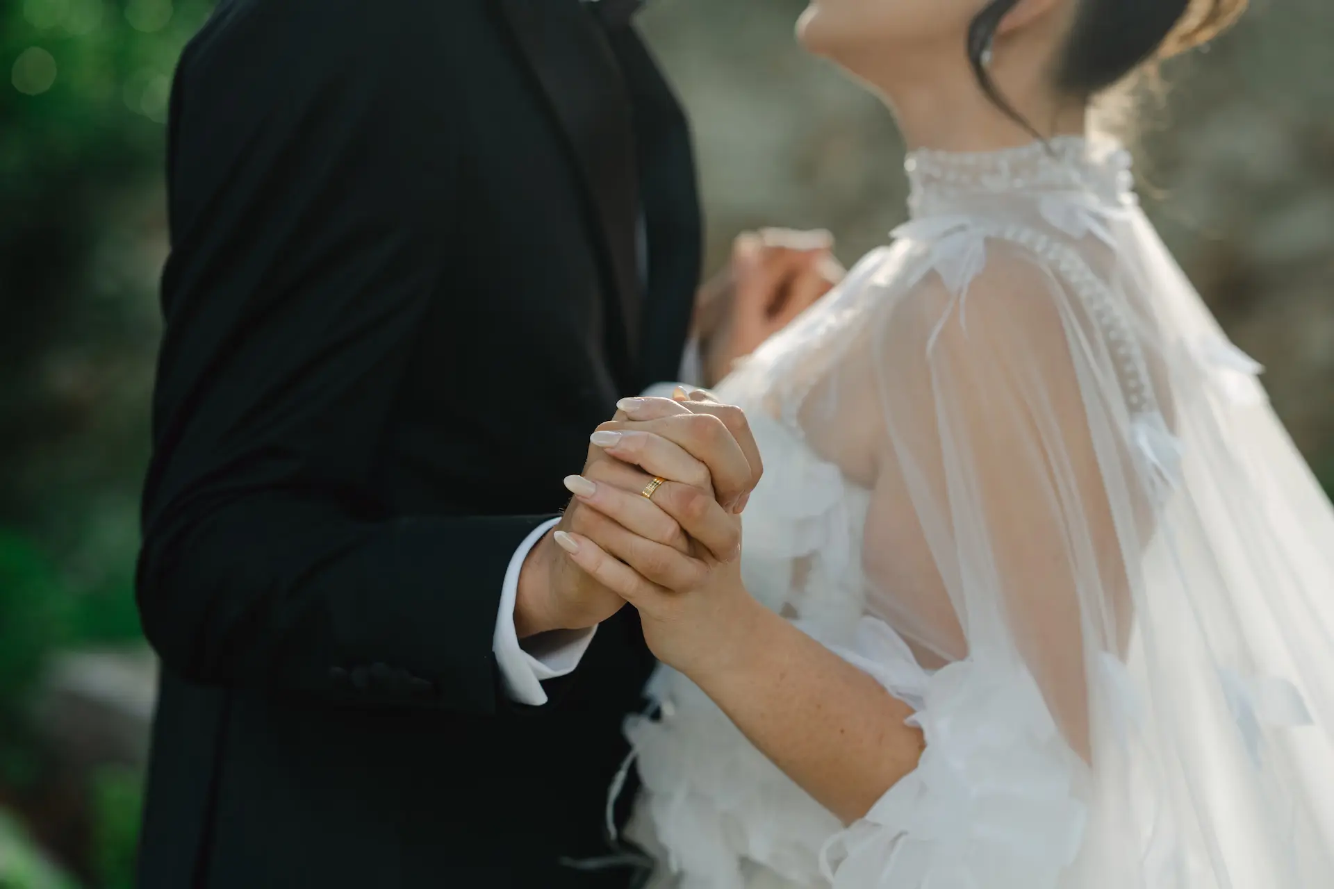 a man and woman holding hands