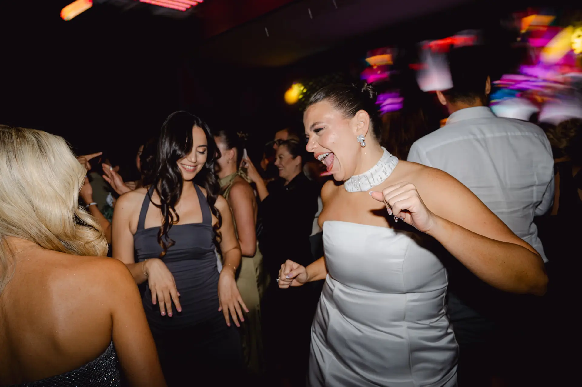 bride partying in the middle of the dancefloor in Alkion venue