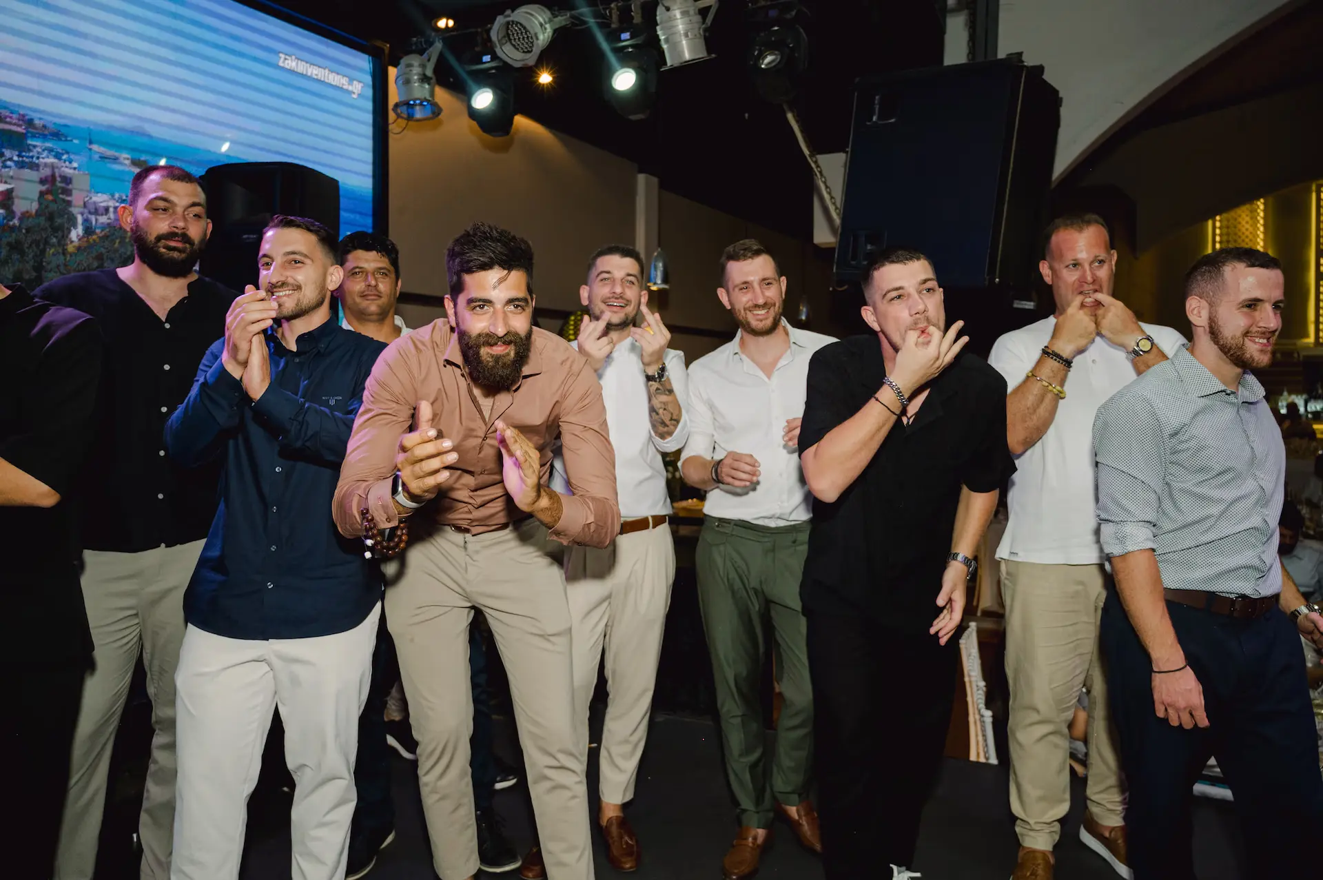 a group of guests dancing