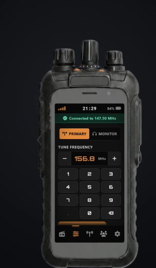 Tuning a frequency on the keypad, with the primary and monitor slots switched from the top of the screen