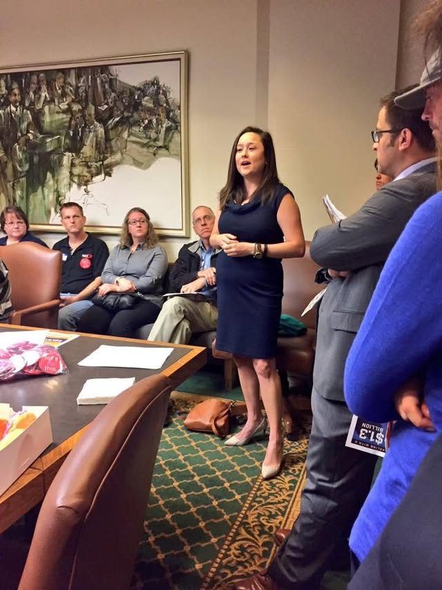A speaker addresses a packed Capitol committee room of Oklahomans.