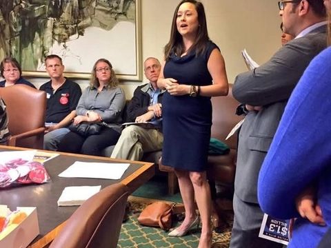 A speaker addresses a packed Capitol committee room of Oklahomans.