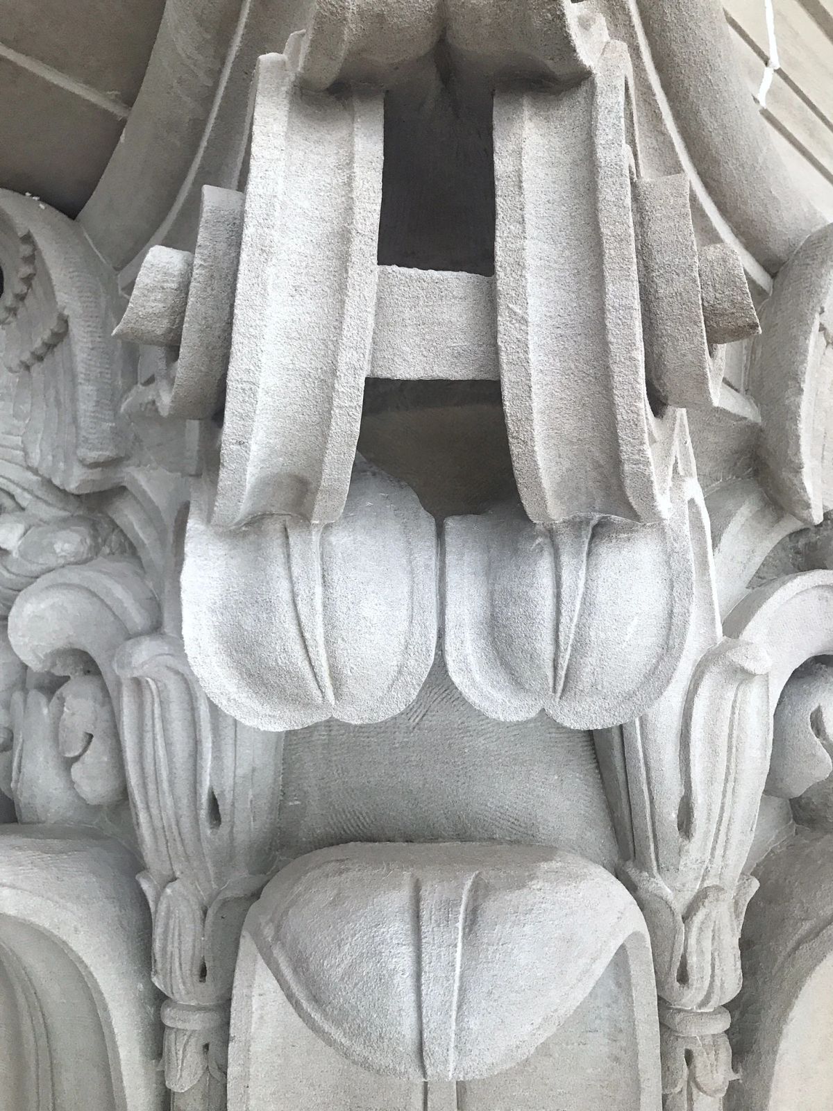 This is all one piece of stone. The original stonemasons carved in and around that block across the middle.&nbsp;