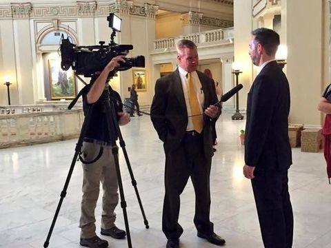 A TV camera records an interview in the Oklahoma Capitol rotunda.