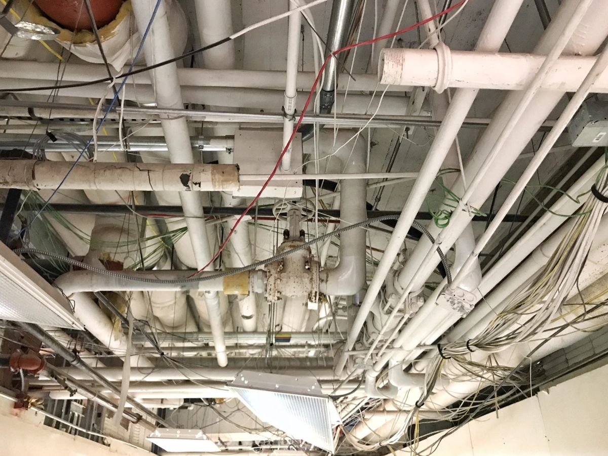 View of what's currently in the basement ceiling. All of this has be re-routed.