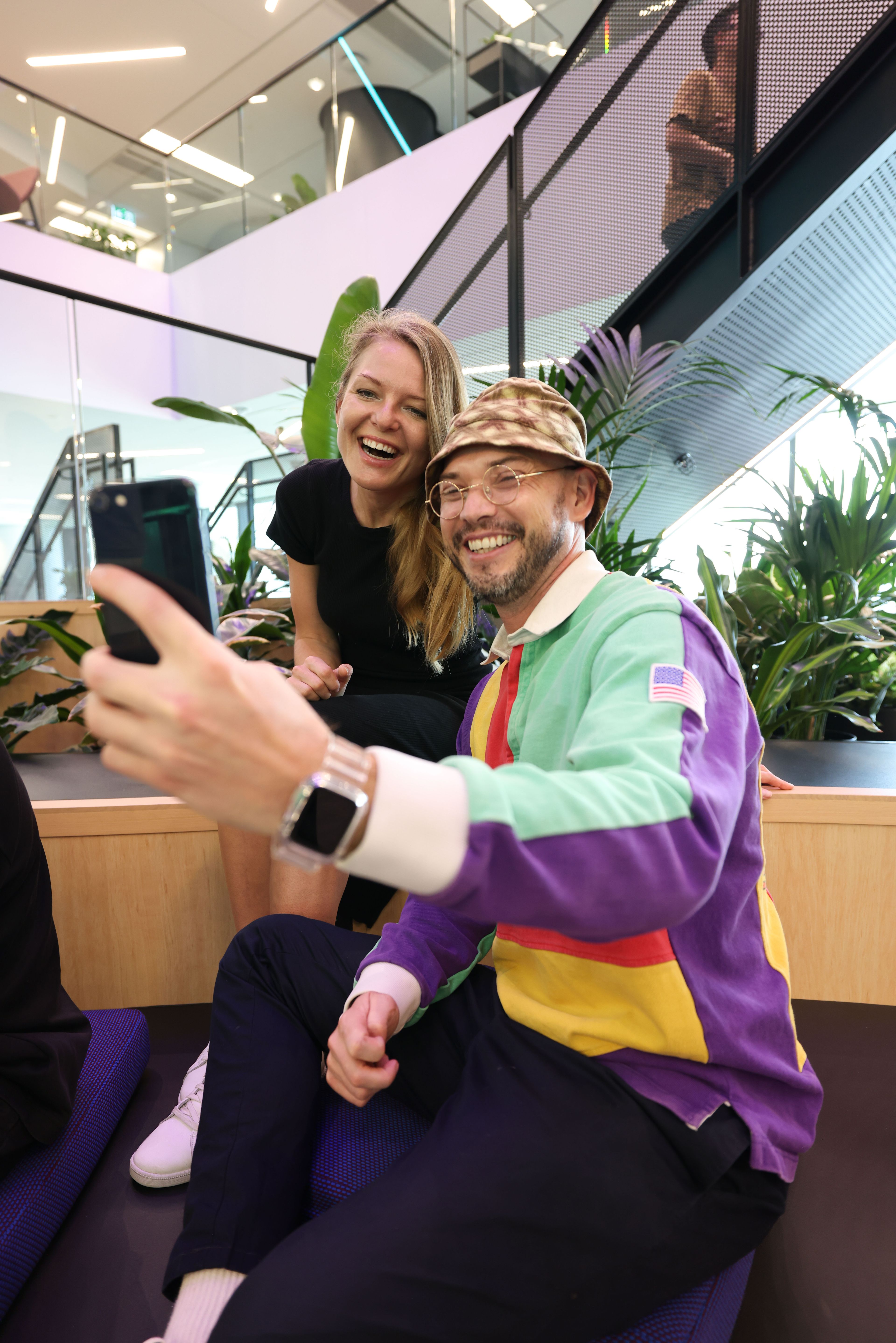 Two Sydney employees talking a selfie.