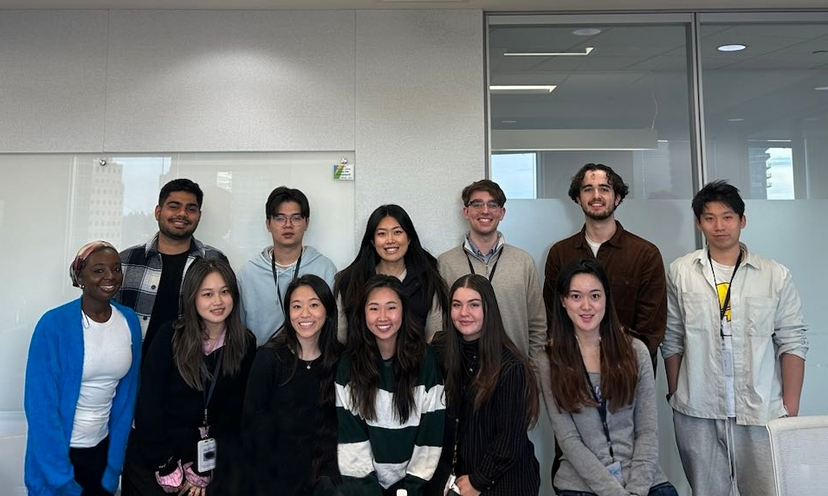 Group of diverse TikTok Shop Interns smiling and posing together for a picture.