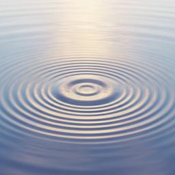 A serene, abstract image depicting gentle ripples in water, reflecting soft, diffused light, symbolizing open awareness and the unfolding of sensory experience without judgment.