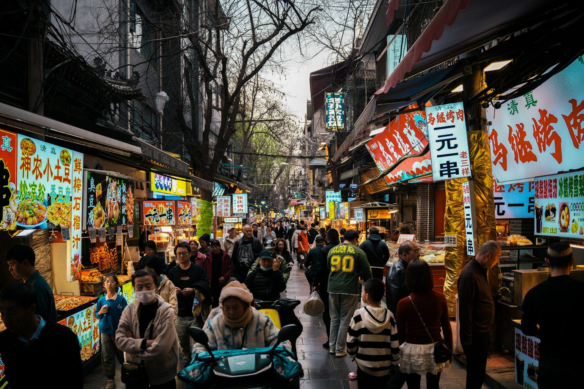 A busy evening street market in Xi'an, China
