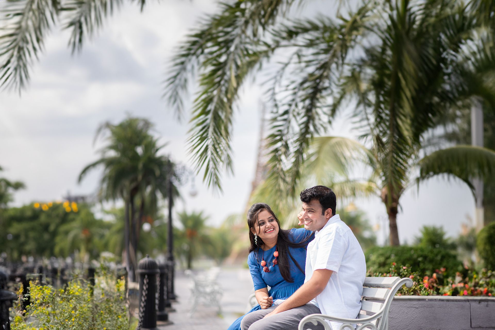 Romantic Park Bench Pre Wedding Photoshoot with Tropical Palm Trees | The Vedic Wedding