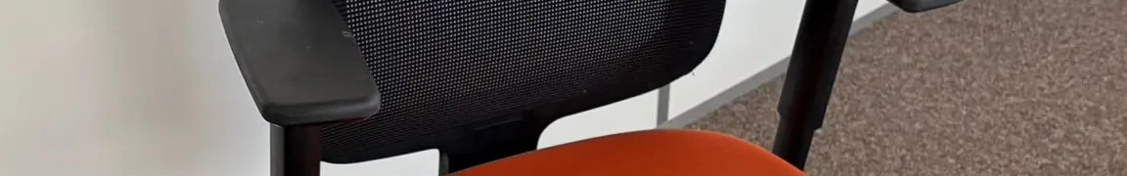 Fauteuil ergonomique Steelcase Reply Air résille noire et tissu orange