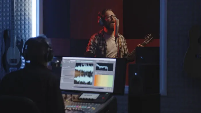musician singing at home studio