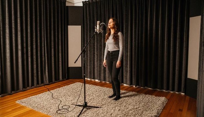 Sarah solved the problem of the wooden floor's acoustics