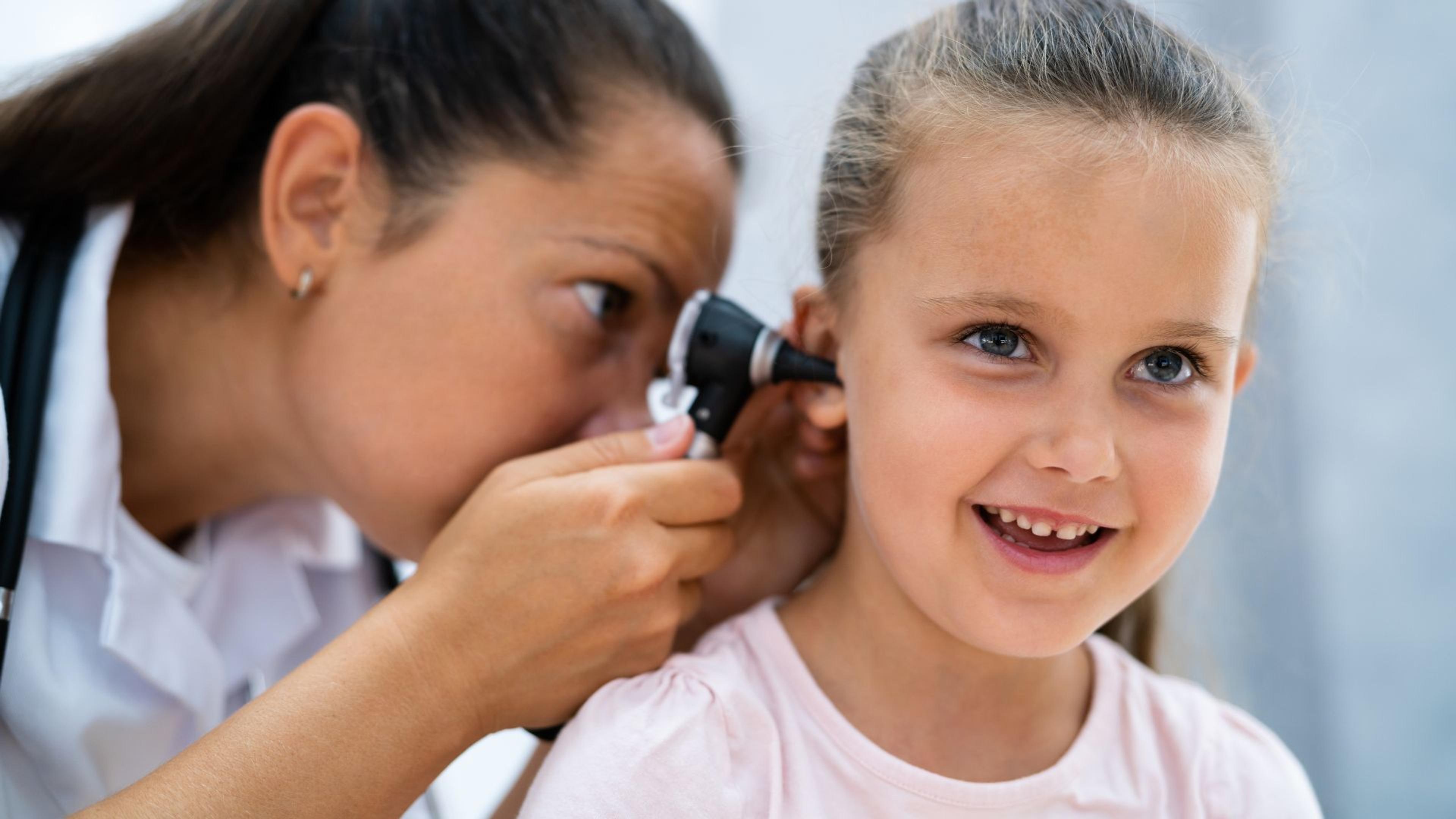 Pediatric ear examination for chronic ear infection diagnosis and chiropractic treatment in Minot ND