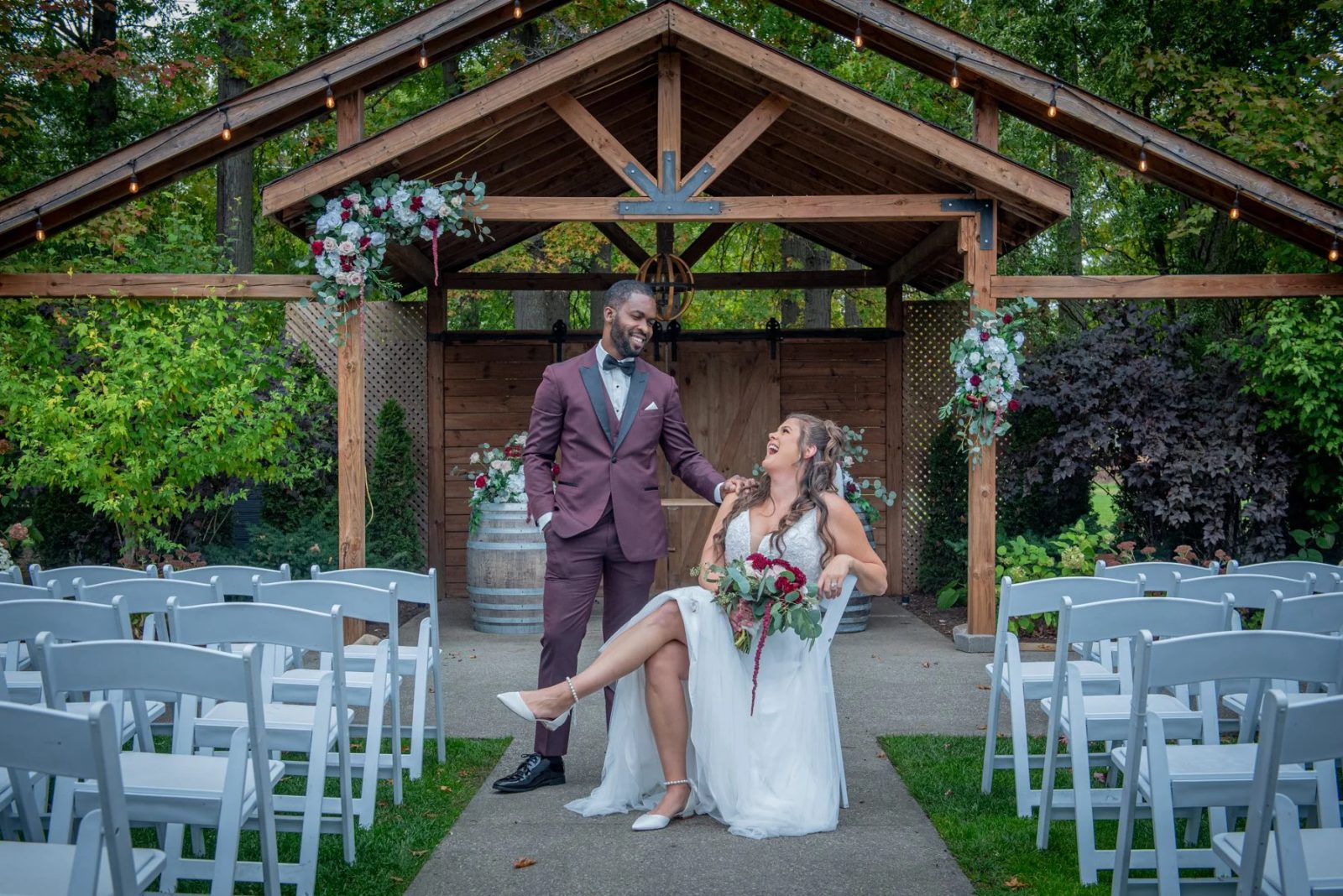 Bride and groom embrace at golden hour