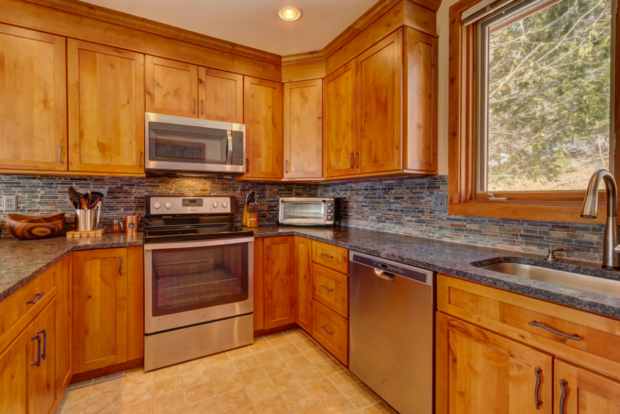 Kitchen Remodel With Rustic Stone Finish — image 5