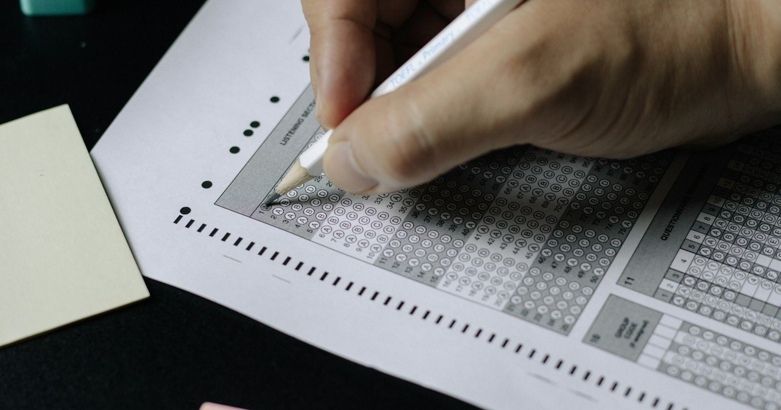 Multiple-choice exam paper with pencil