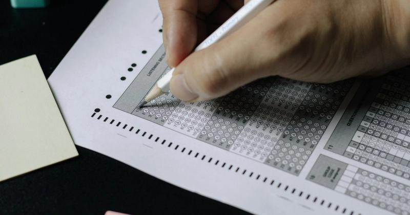 Multiple-choice exam paper with pencil