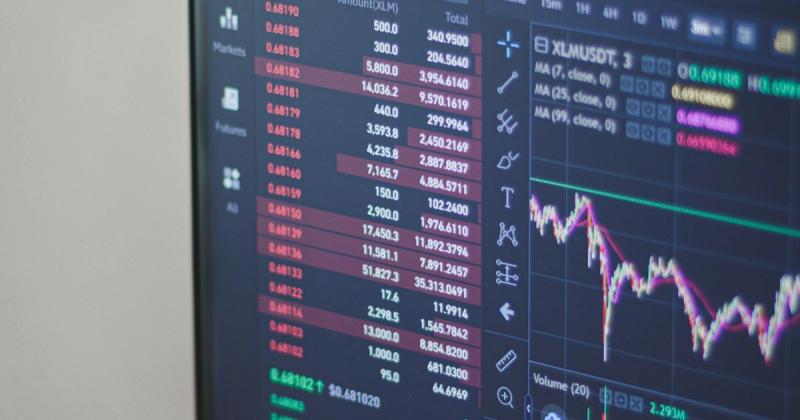 Stock trading monitors showing live charts