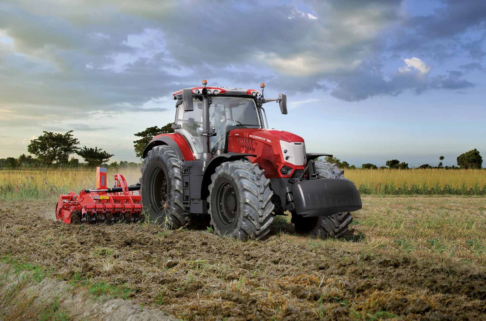 McCormick tractor working in a field