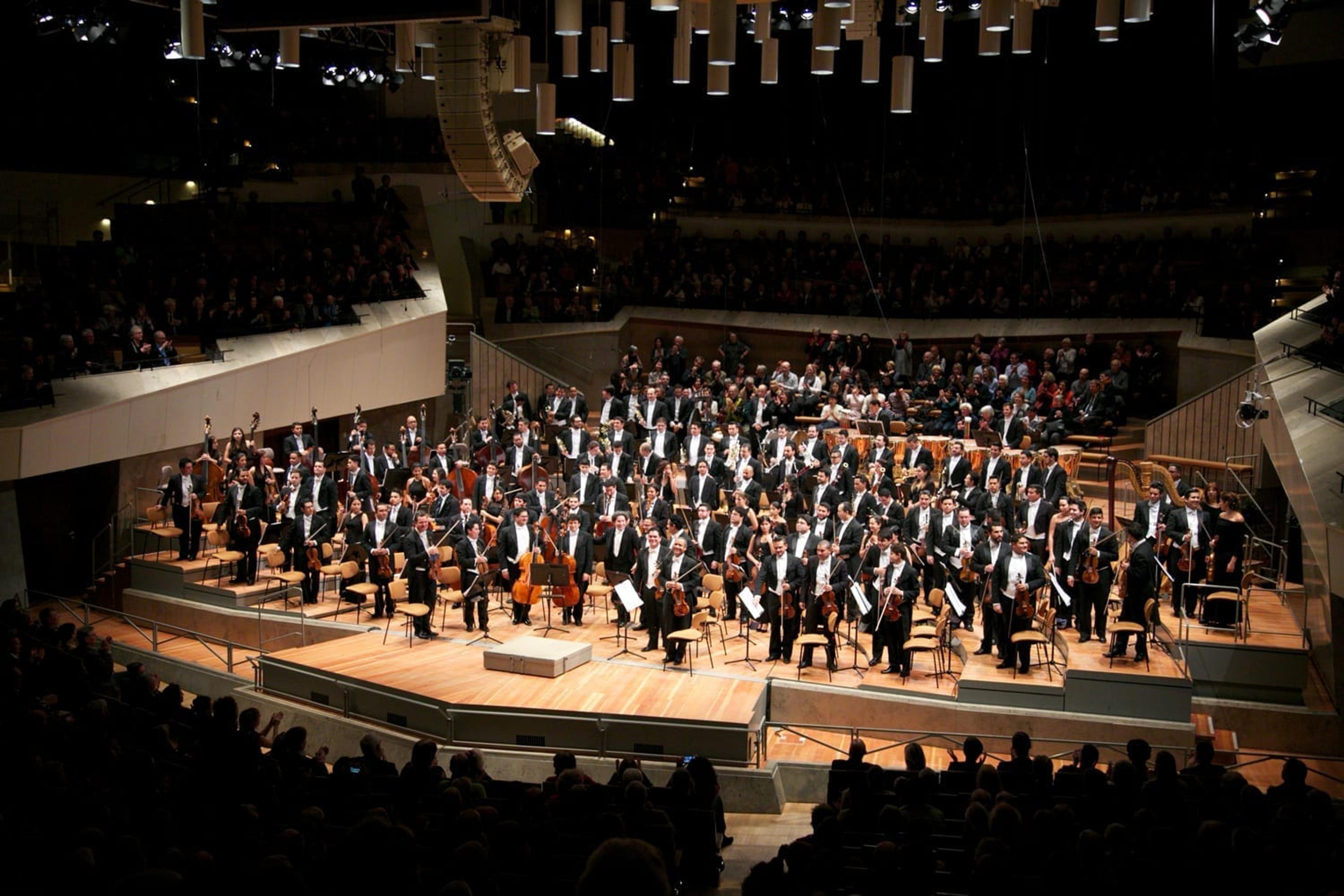 Musicians of the Simon Bolivar orchestra on stage at the Philharmonie in Berlin