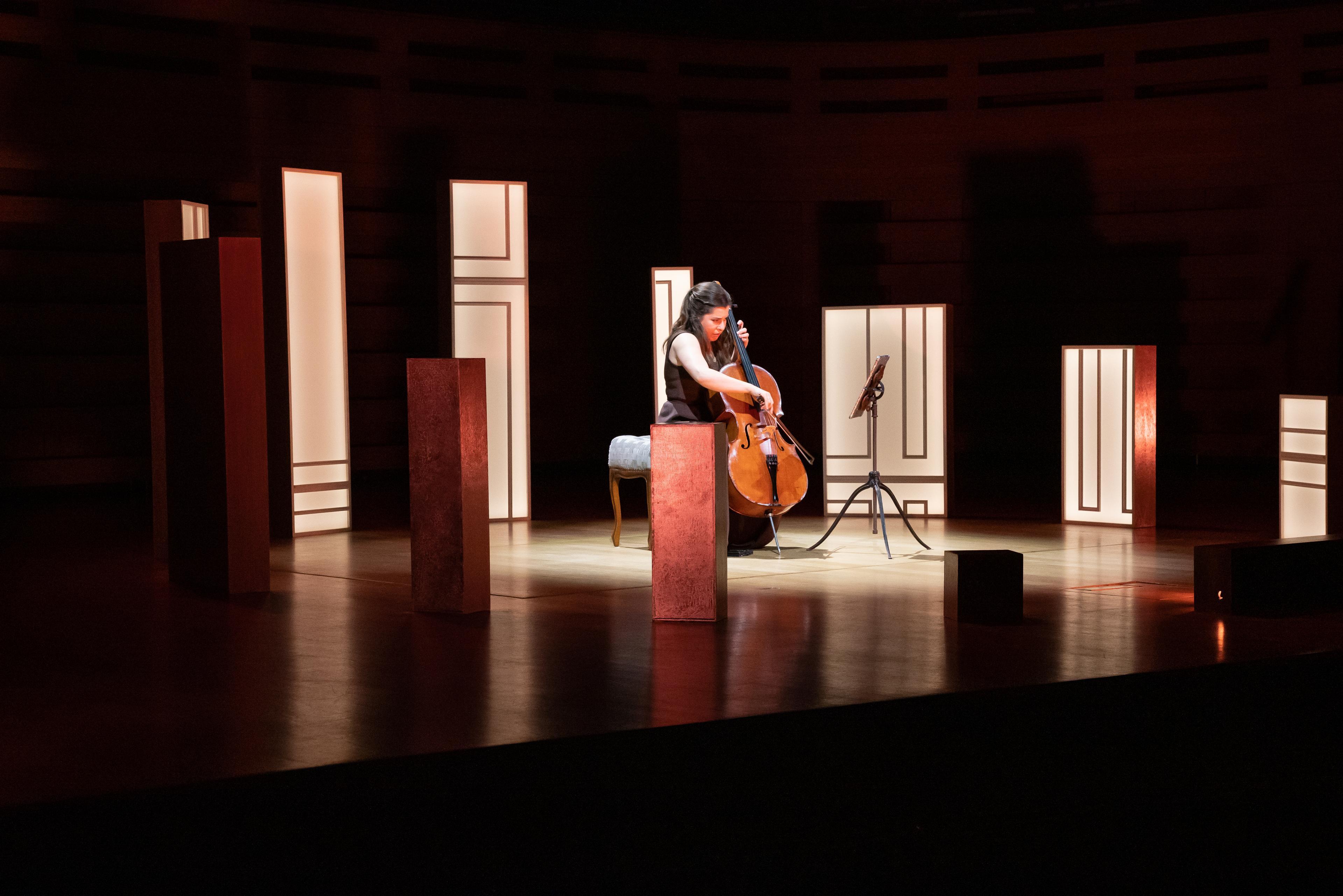 Cellist Alisa Weilerstein performs encircled by light boxes