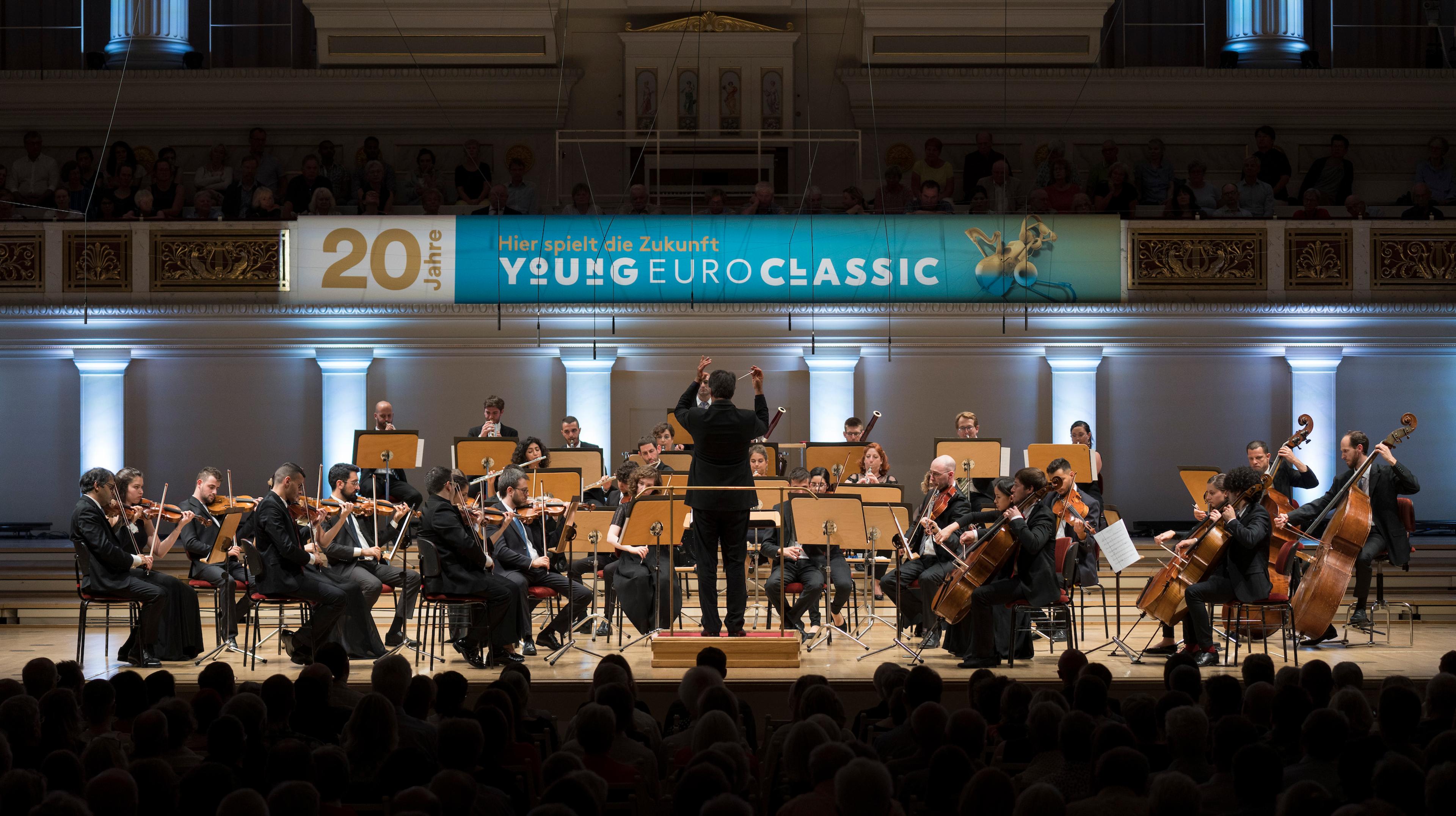 The orchestra performing on stage in Berlin
