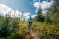 Person mountain biking at the Wapiti Nordic Centre