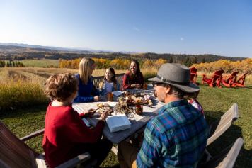 Family having lunch with Forage & Farm