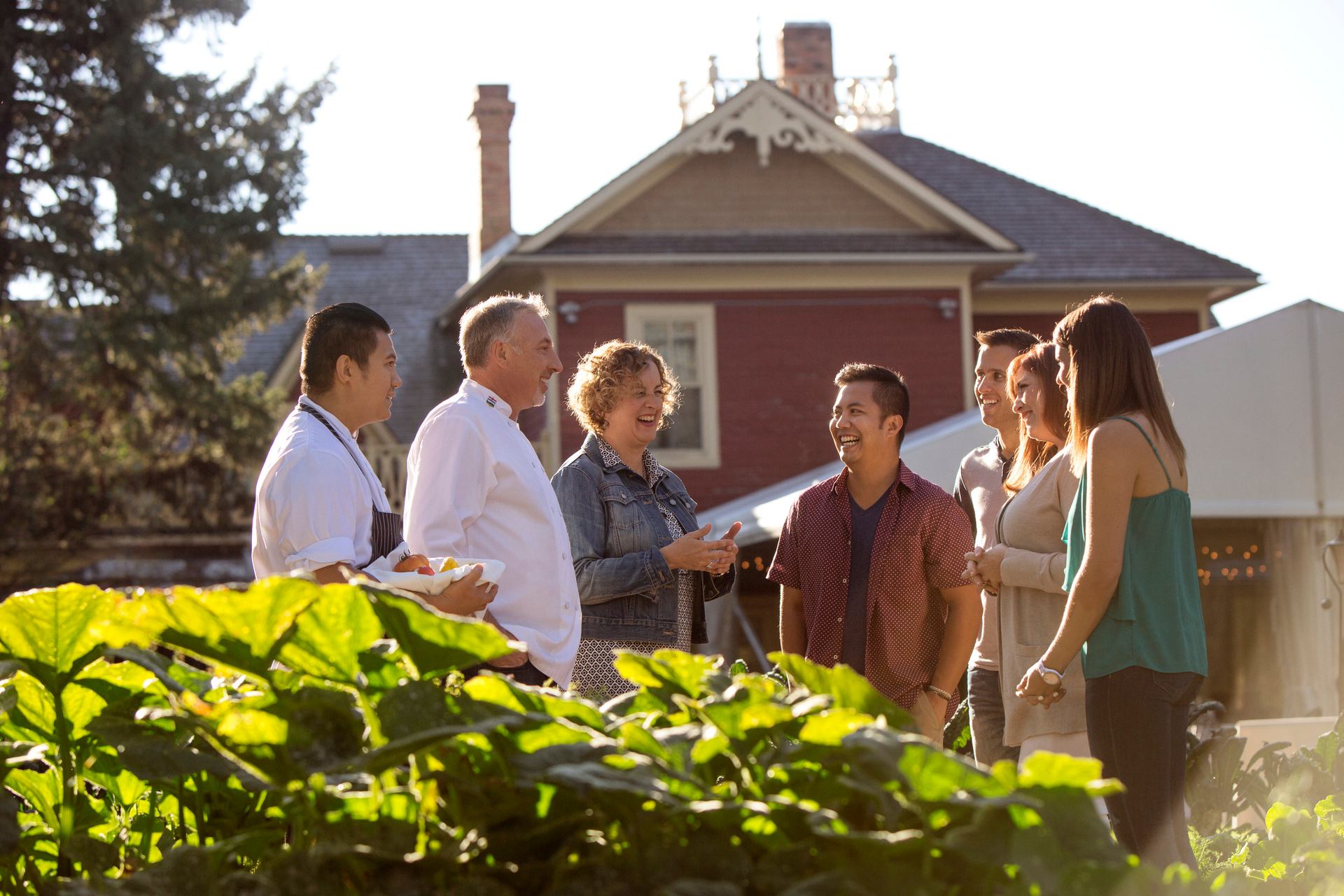 Group of people learning about Rouge restaurant’s farm to fork process