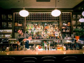 Bartender making a drink at Bar Clementine in Edmonton