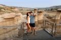 Couple taking a selfie at the Hoodoos in Drumheller