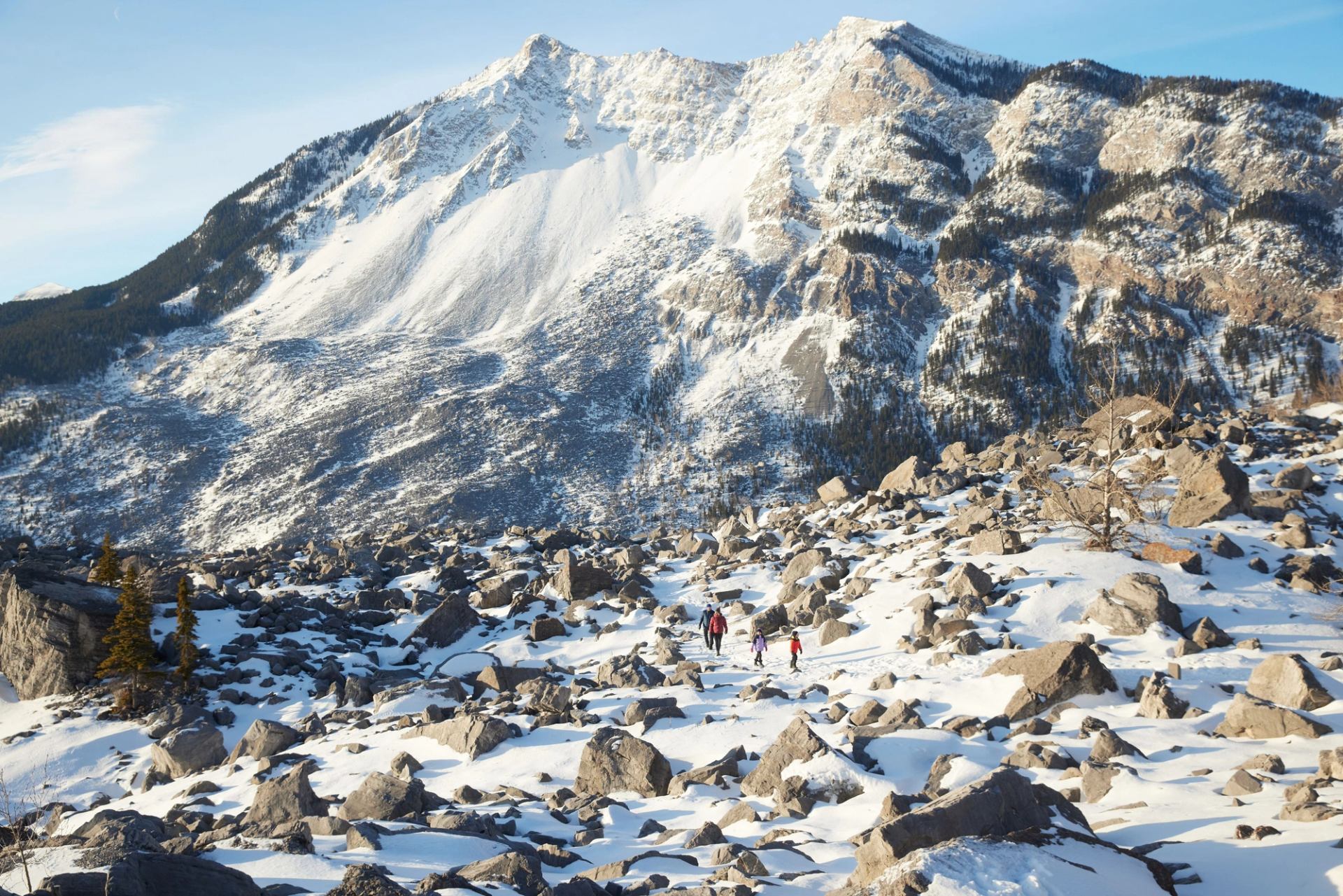 People hiking and exploring at Frank Slide in the Crowsnest Pass.