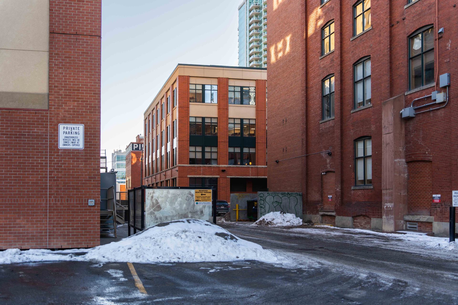 Red brick buildings in a Calgary alleyway