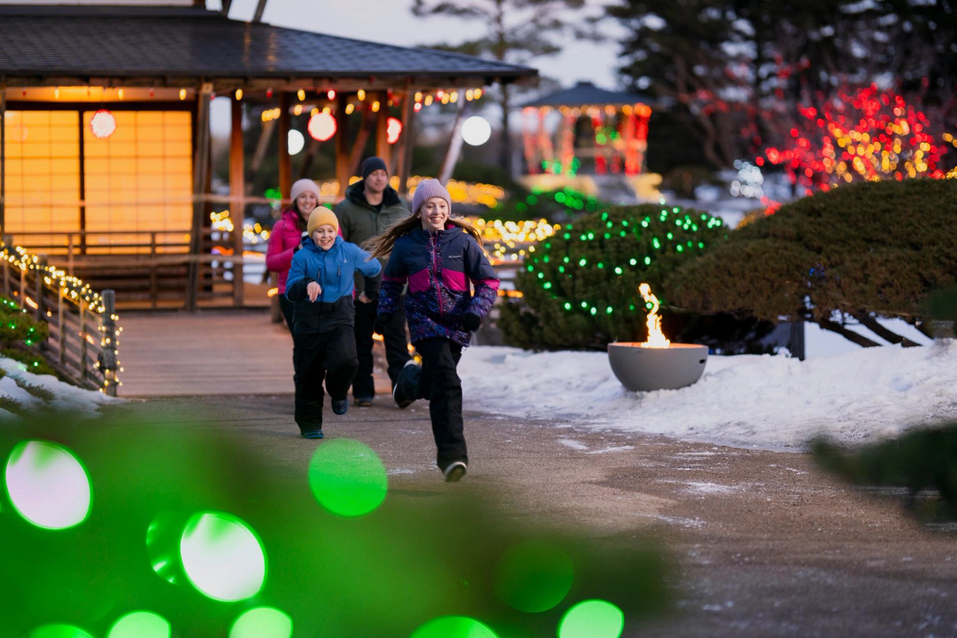 A family enjoy the lights at Nikka Yuko Japanese Gardens in Lethbridge