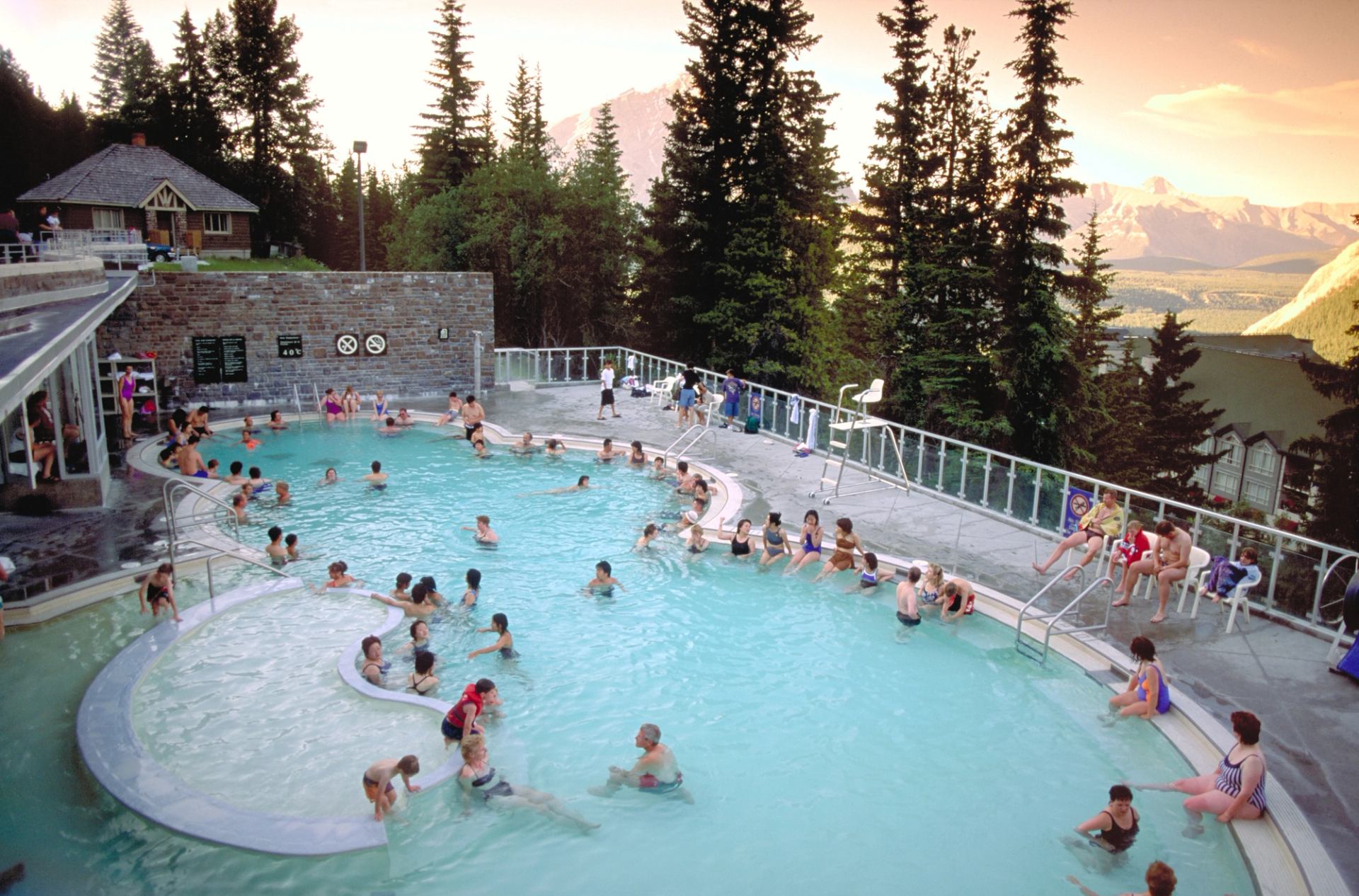 People enjoying the Banff Upper Hot Springs in Banff National Park