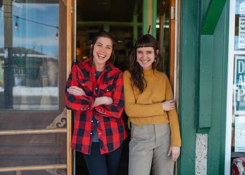 Women standing outside of Bertie's General store in Black Diamond