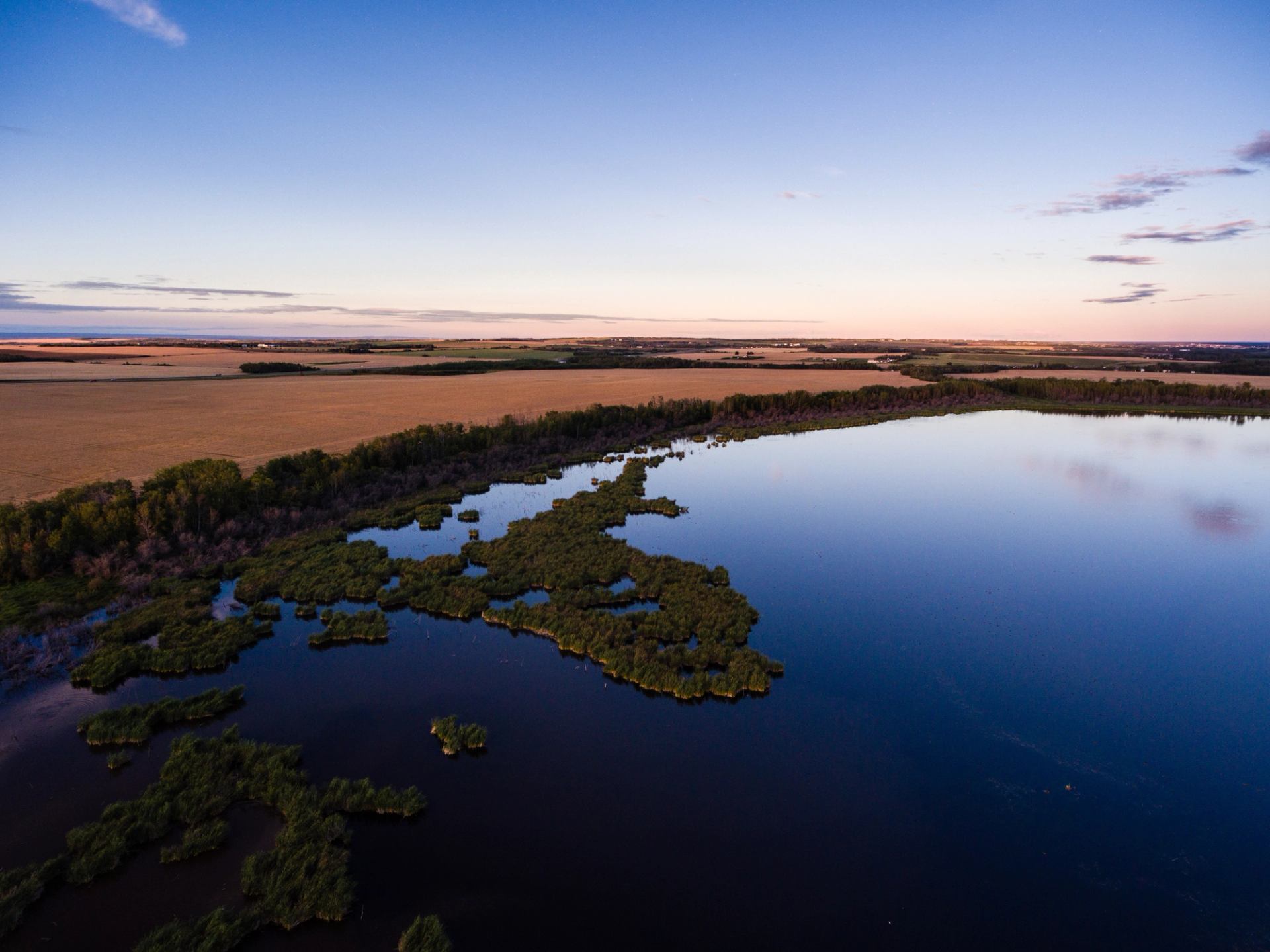 Aerial shot of a lake in Grande Prairie.