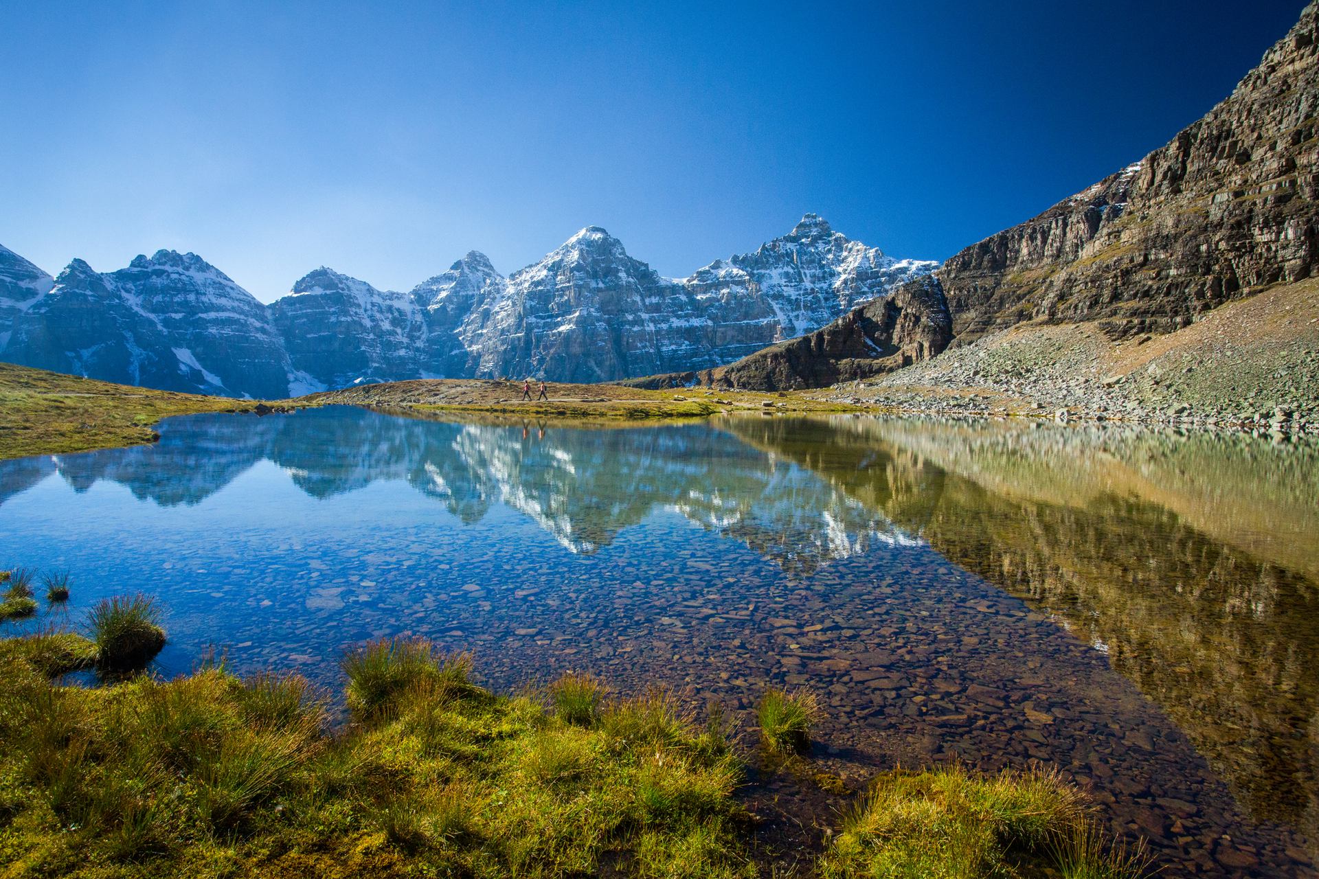 Hikers explore the Sentinel Pass Trail in Banff National Park.