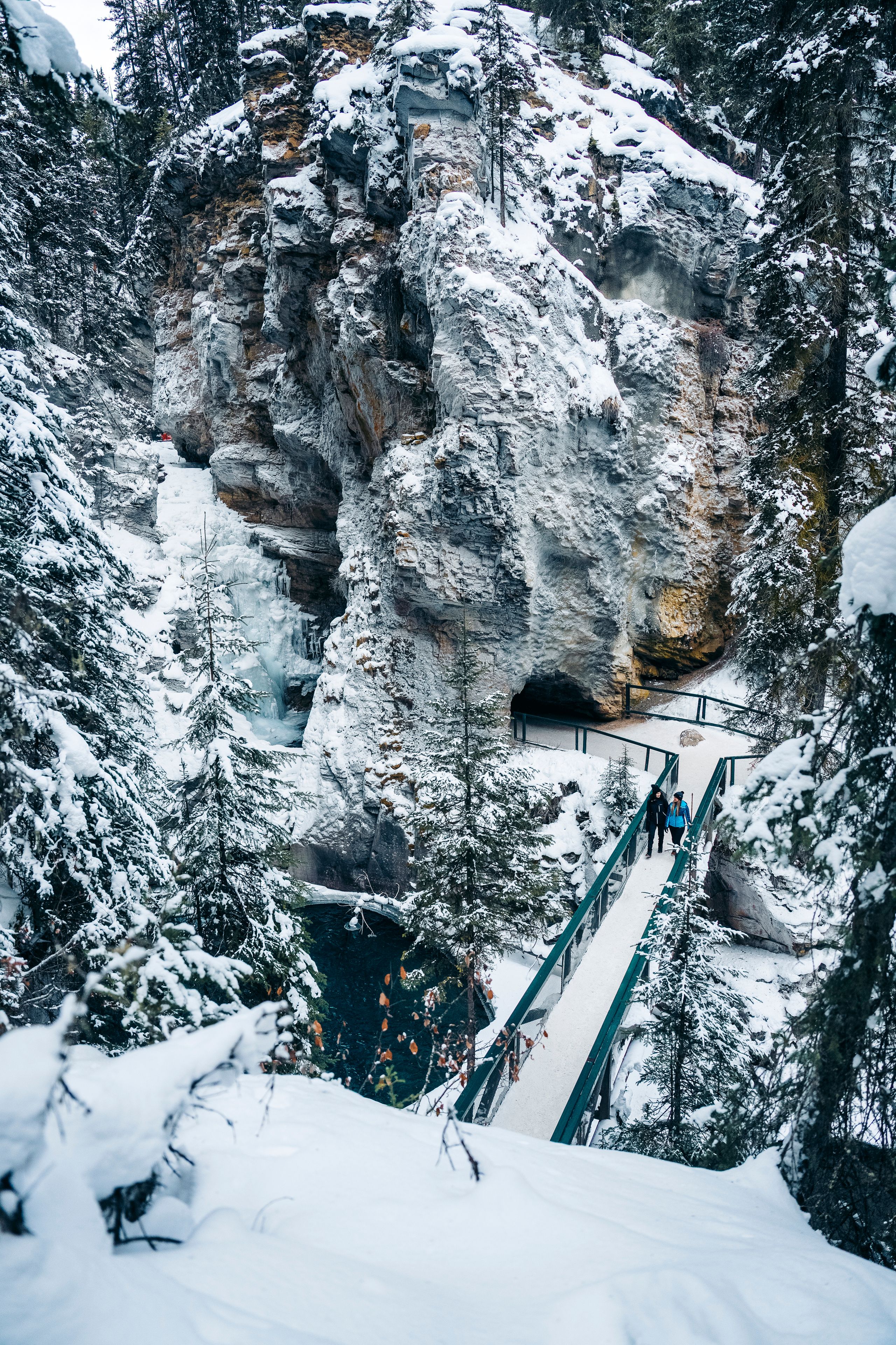 Hikers on the trail to Johnston Canyon