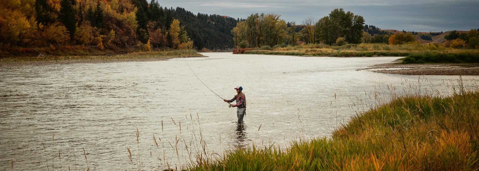 Paula Shearer fly-fishing in the Bow River