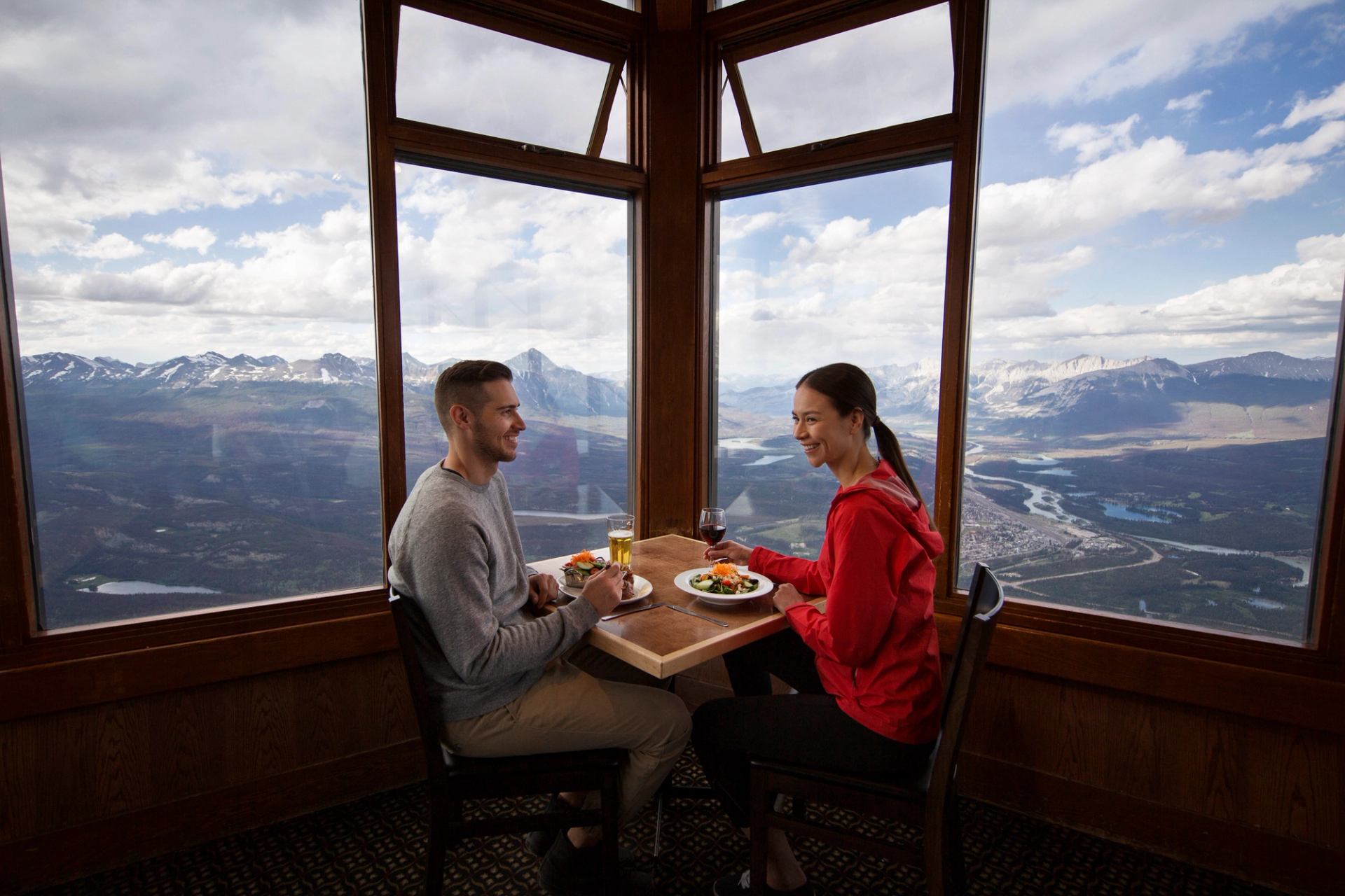 Couple enjoying dinner at the Summit Restaurant in Jasper