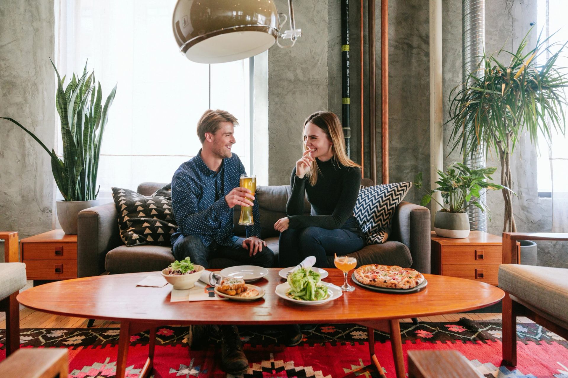 Couple enjoying a meal at Bridgette Bar in Calgary