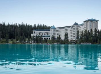 A view of the blue lake at Fairmont Chateau Lake Louise in Banff National Park, Alberta.