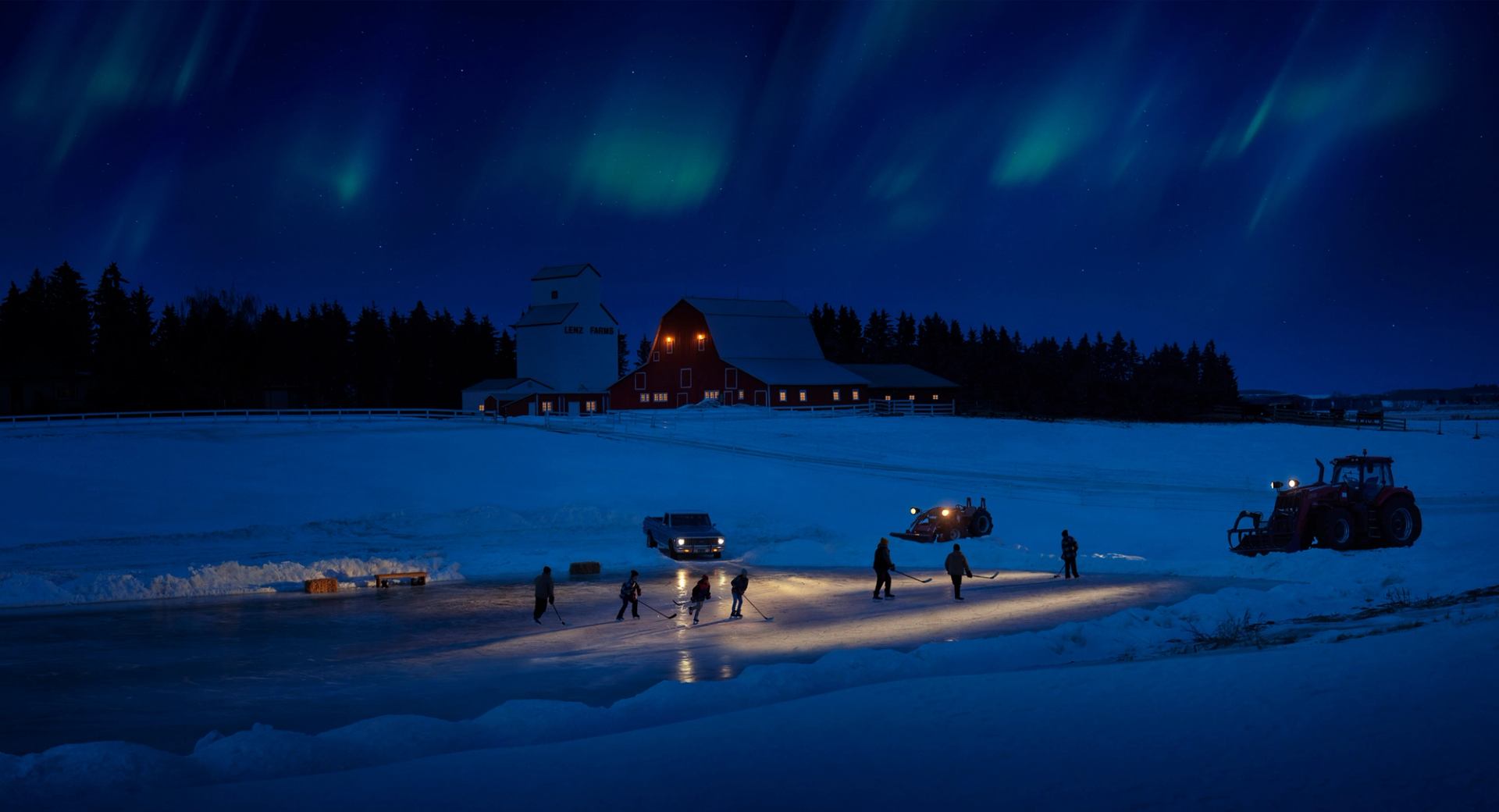 Team playing a game of night time pond hockey on a rural Albertan farm.