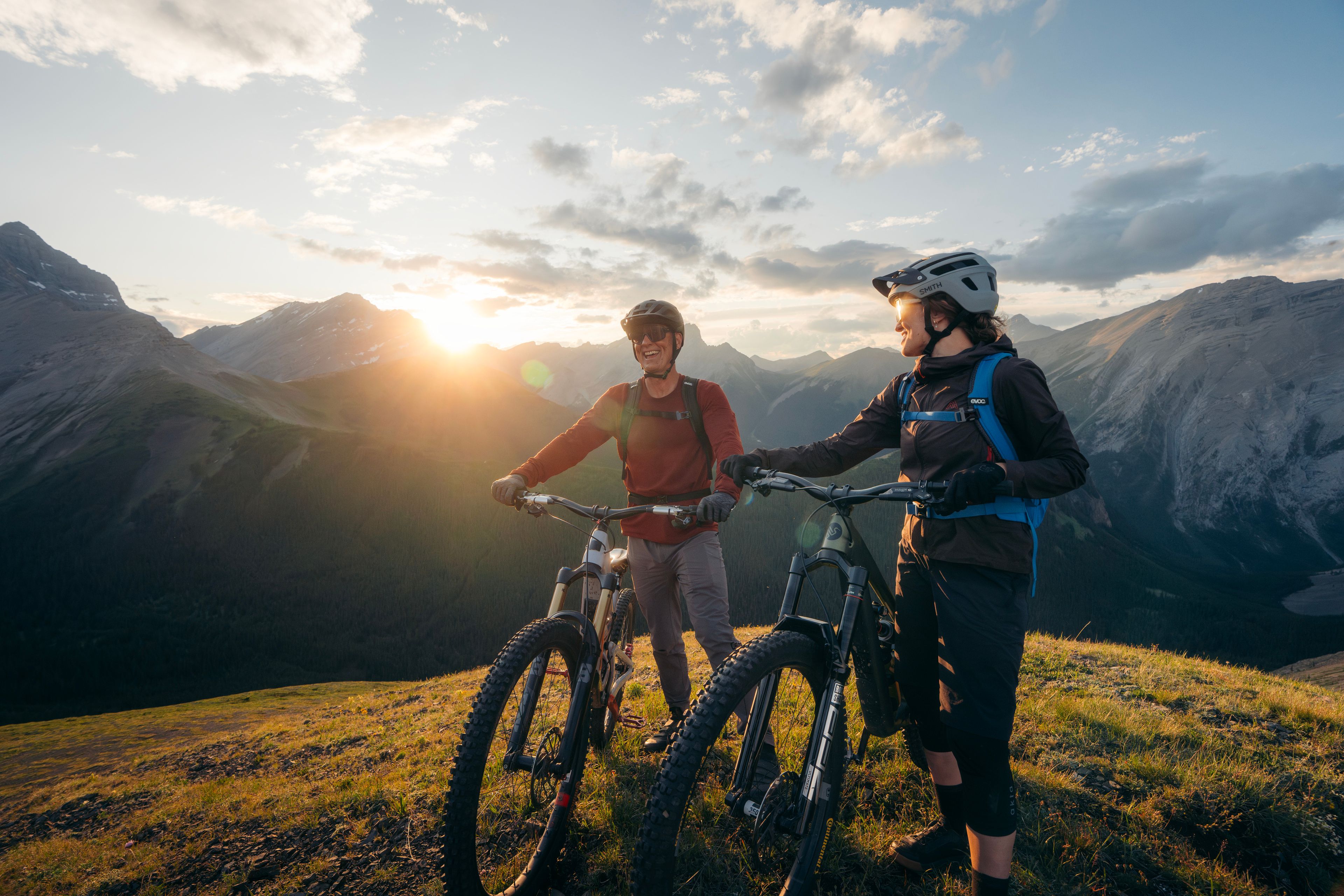 2 Mountain Bikers rest their bikes atop Fortress Mountain